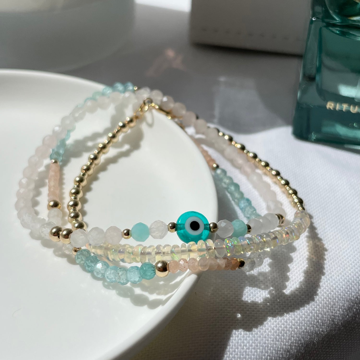 Best-selling natural crystal bracelets, with Rose Quartz, Evil Eye and Opals