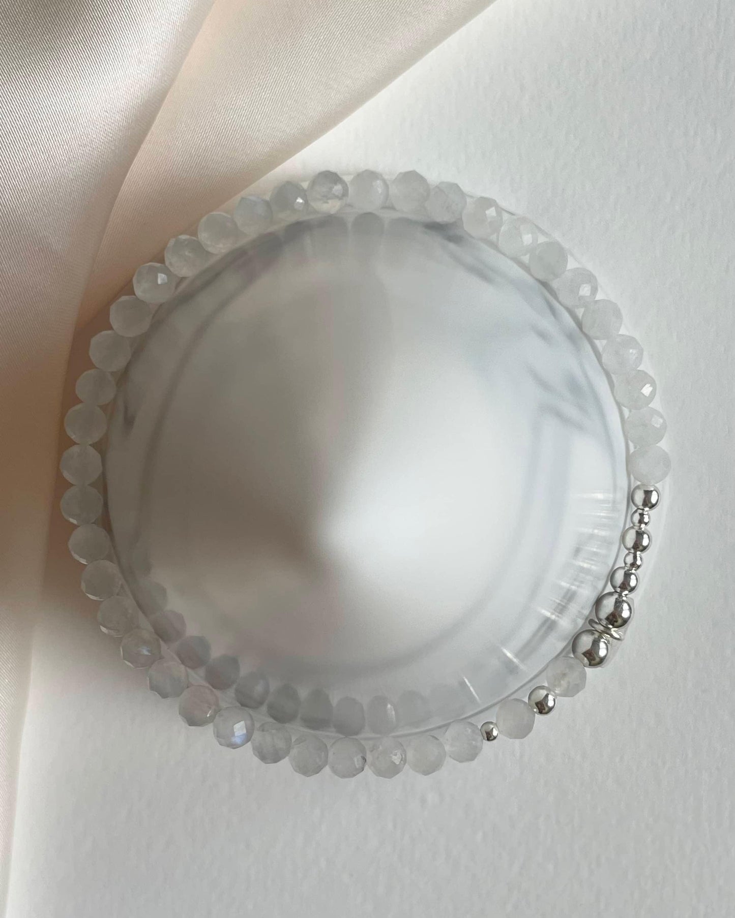925 Sterling Silver June birthstone bracelet: A gleaming stretch bracelet featuring natural Moonstone crystals and Sterling Silver beads.