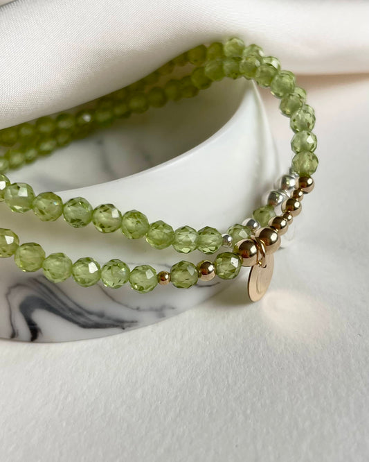 August Peridot birthstone bracelet: Handcrafted elegance with natural Peridot gemstone, set in a blend of 925 Sterling Silver and Gold Filled beads.