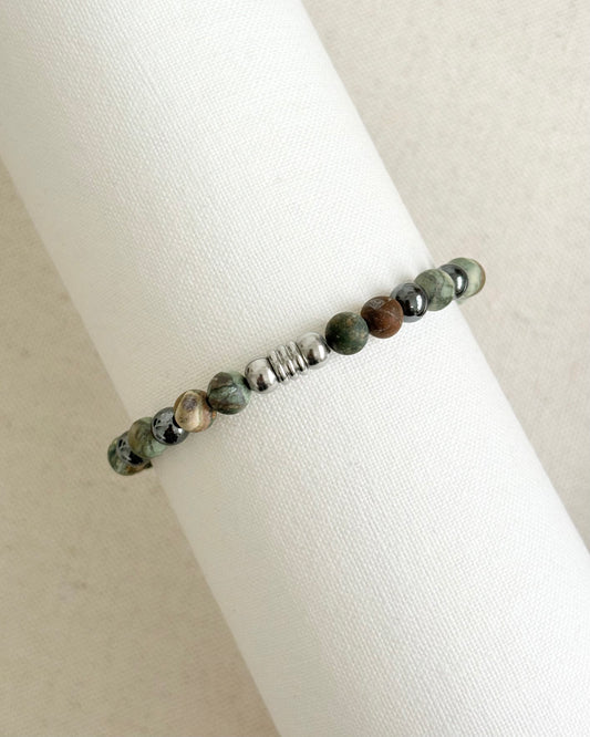 Renewal and Balance | Green Rhyolite + Hematite