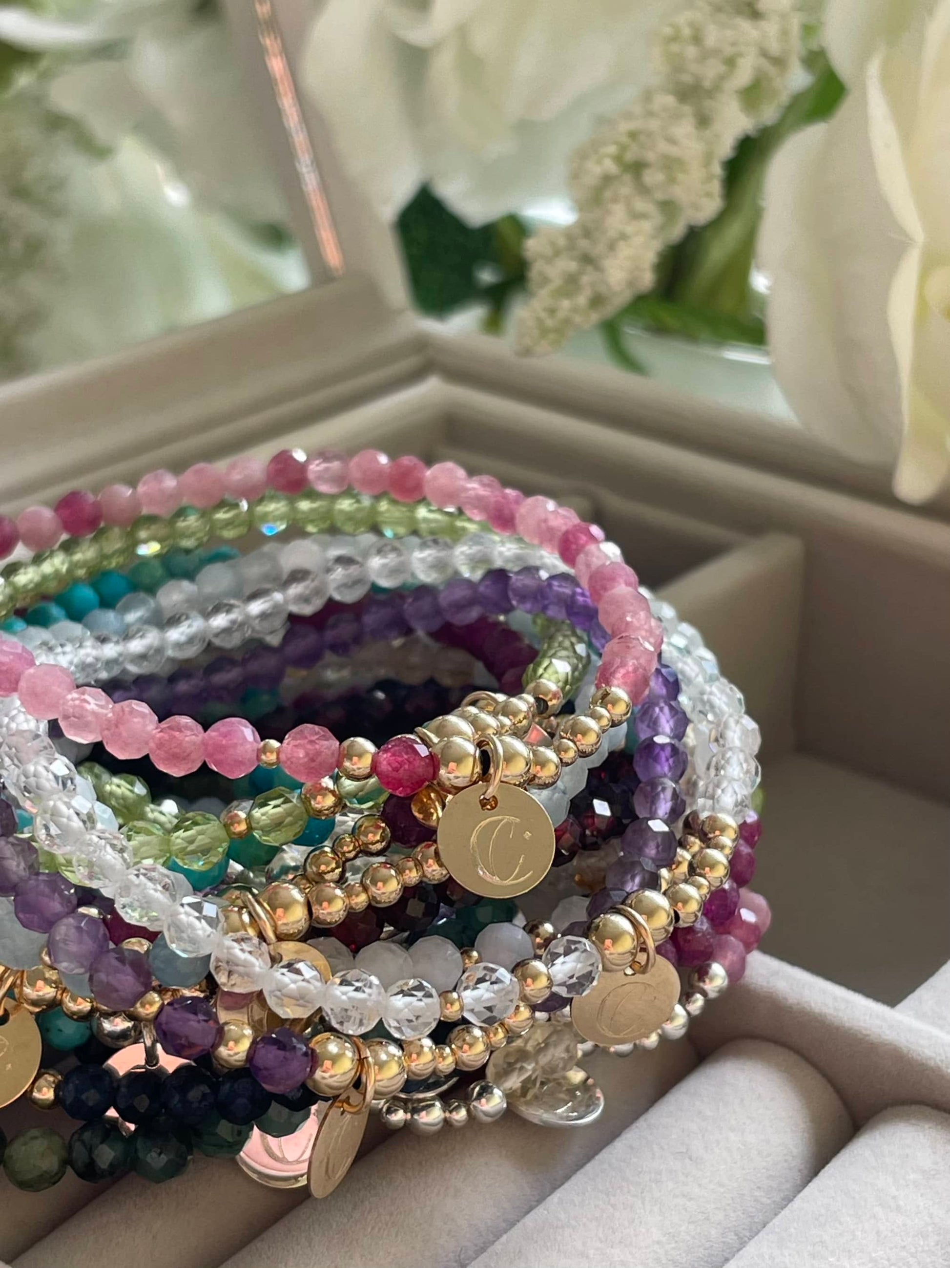 A range of dainty stretch bracelets featuring natural gemstones for Birthstone bracelets. Made by Clarity and Calm.